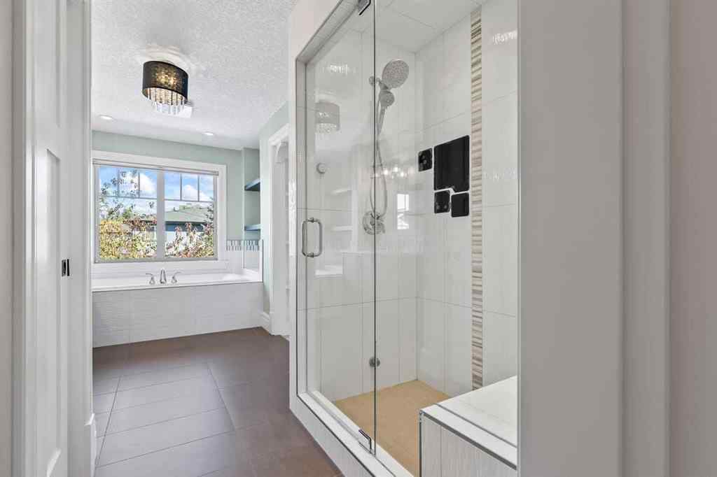 MLS® A2259988 - 236 Aspen Dale Way SW in Aspen Woods Calgary, Residential