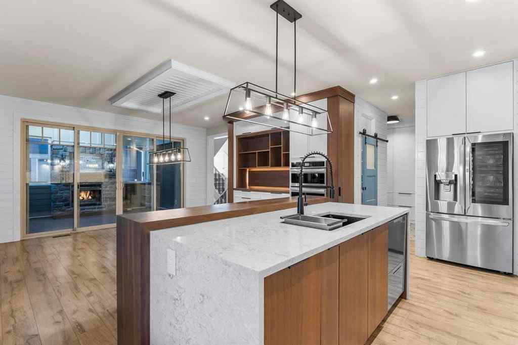 MLS® A2259988 - 236 Aspen Dale Way SW in Aspen Woods Calgary, Residential