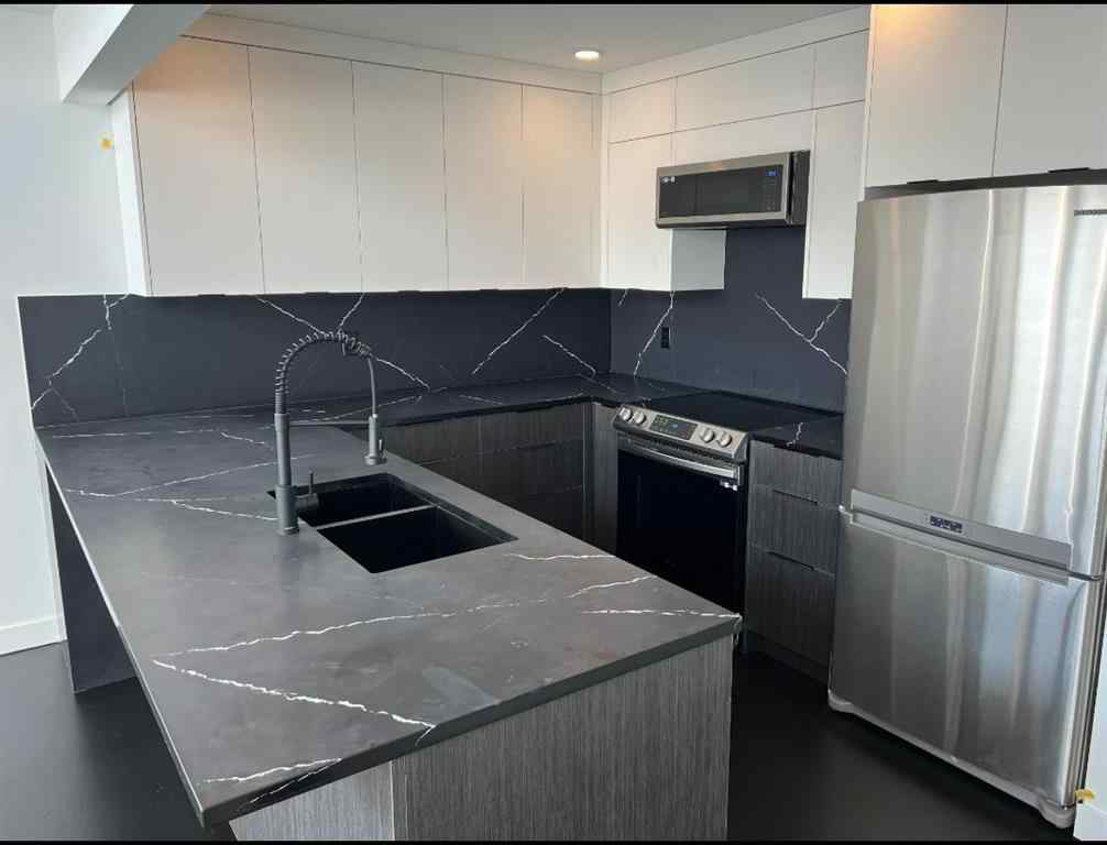 MLS® A2259996 - Unit #102 1800 26 Avenue SW in Bankview Calgary, Residential