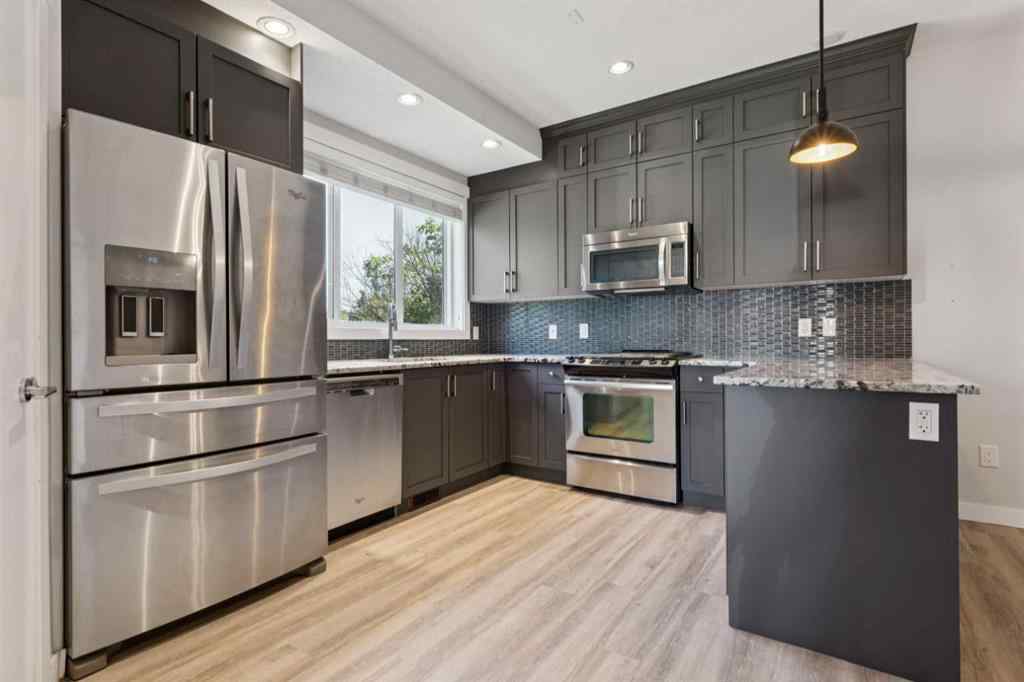 MLS® A2260033 - Unit #1 4513 Bowness Road NW in Montgomery Calgary, Residential