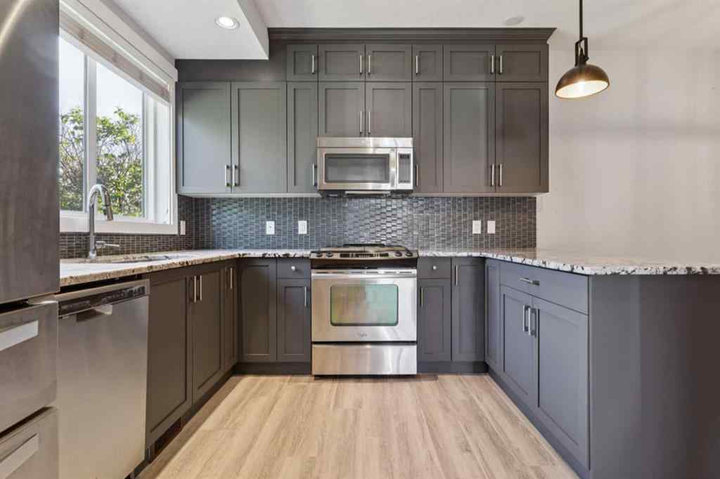 MLS® A2260033 - Unit #1 4513 Bowness Road NW in Montgomery Calgary, Residential