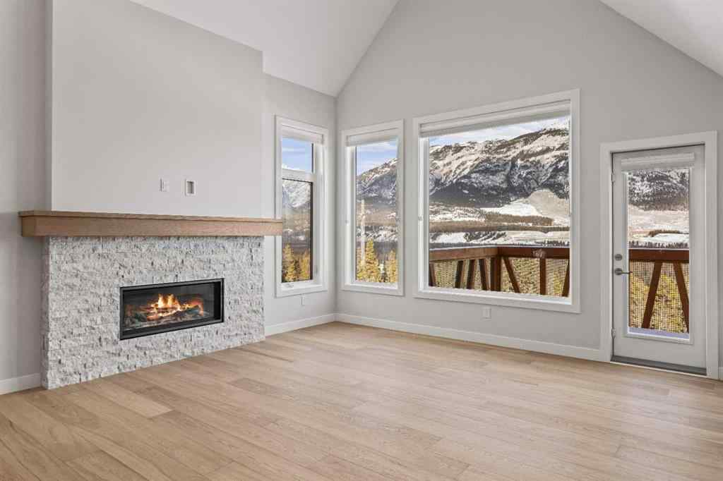 MLS® A2260034 - Unit #201J 209 Stewart Creek Rise  in Three Sisters Canmore, Residential