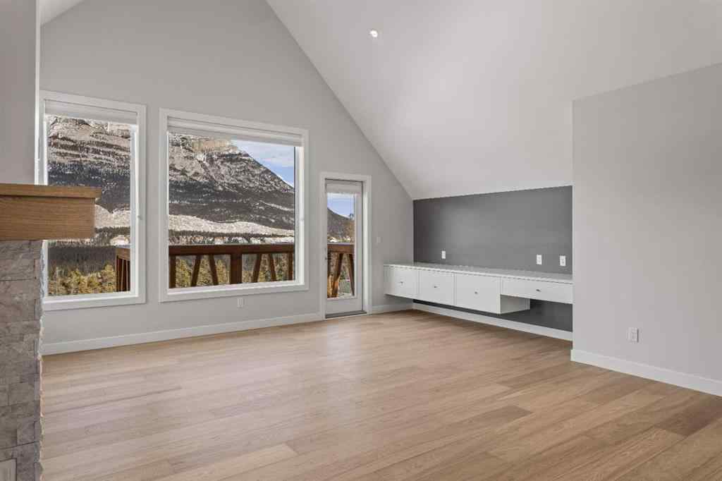MLS® A2260034 - Unit #201J 209 Stewart Creek Rise  in Three Sisters Canmore, Residential