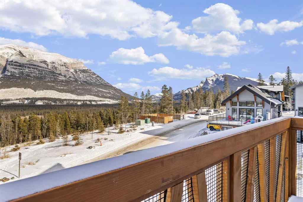 MLS® A2260034 - Unit #201J 209 Stewart Creek Rise  in Three Sisters Canmore, Residential