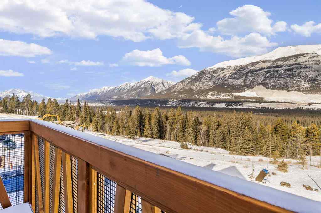 MLS® A2260034 - Unit #201J 209 Stewart Creek Rise  in Three Sisters Canmore, Residential