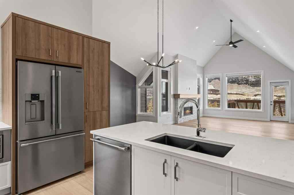 MLS® A2260034 - Unit #201J 209 Stewart Creek Rise  in Three Sisters Canmore, Residential