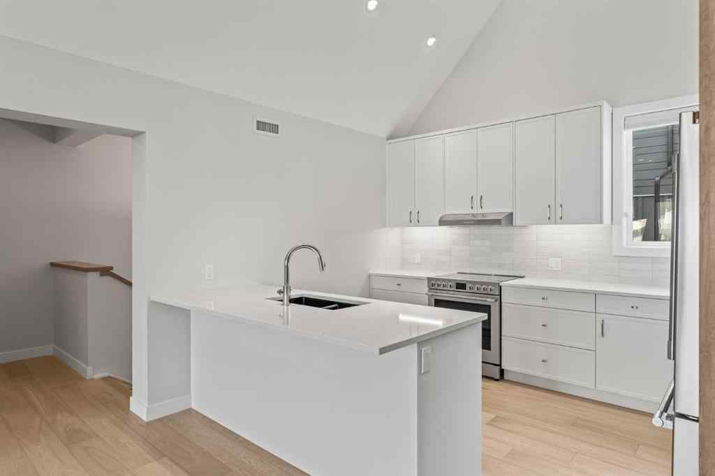 MLS® A2260034 - Unit #201J 209 Stewart Creek Rise  in Three Sisters Canmore, Residential