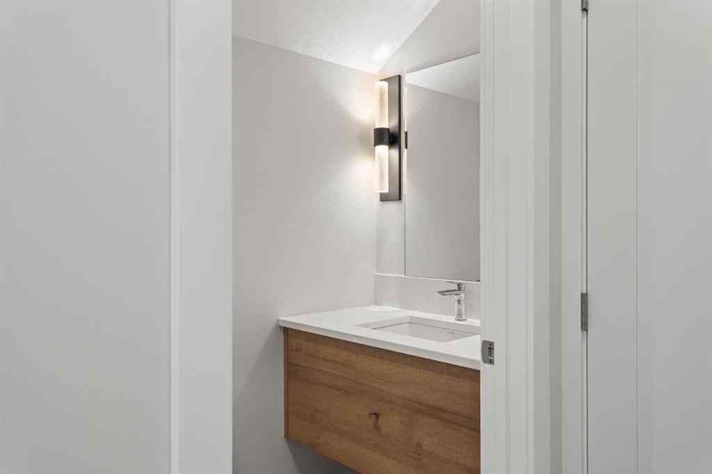 MLS® A2260034 - Unit #201J 209 Stewart Creek Rise  in Three Sisters Canmore, Residential