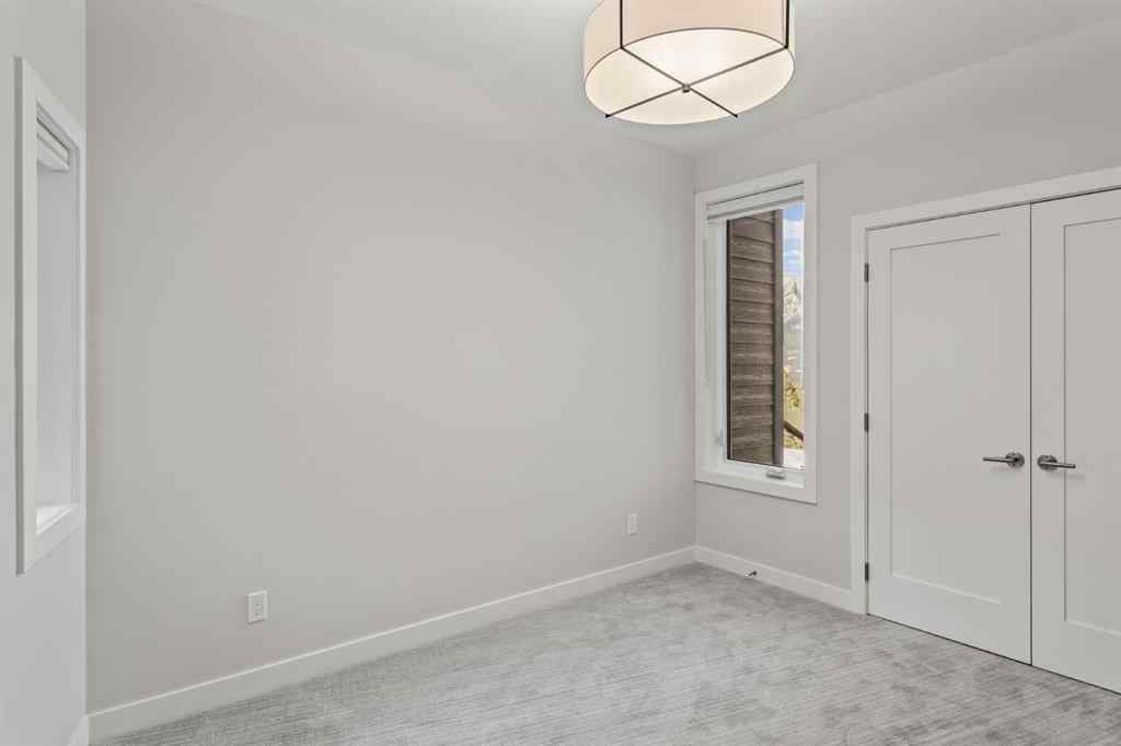 MLS® A2260034 - Unit #201J 209 Stewart Creek Rise  in Three Sisters Canmore, Residential