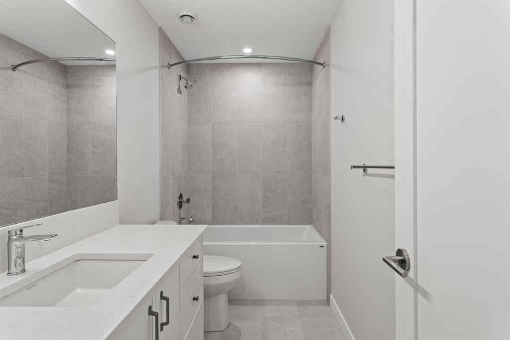 MLS® A2260034 - Unit #201J 209 Stewart Creek Rise  in Three Sisters Canmore, Residential