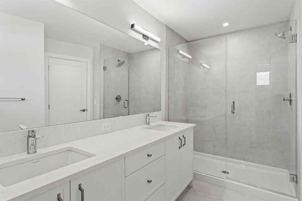 MLS® A2260034 - Unit #201J 209 Stewart Creek Rise  in Three Sisters Canmore, Residential