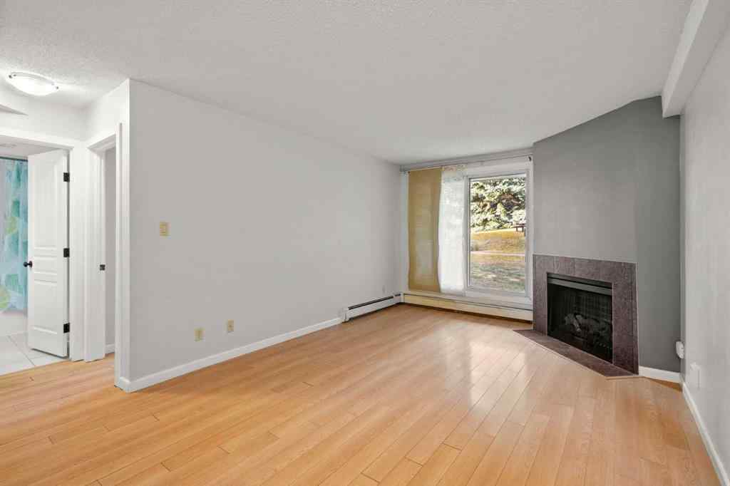 MLS&reg; # A2260039 - Unit #412 6400 Coach Hill Road SW in Coach Hill Calgary, Residential Open Houses