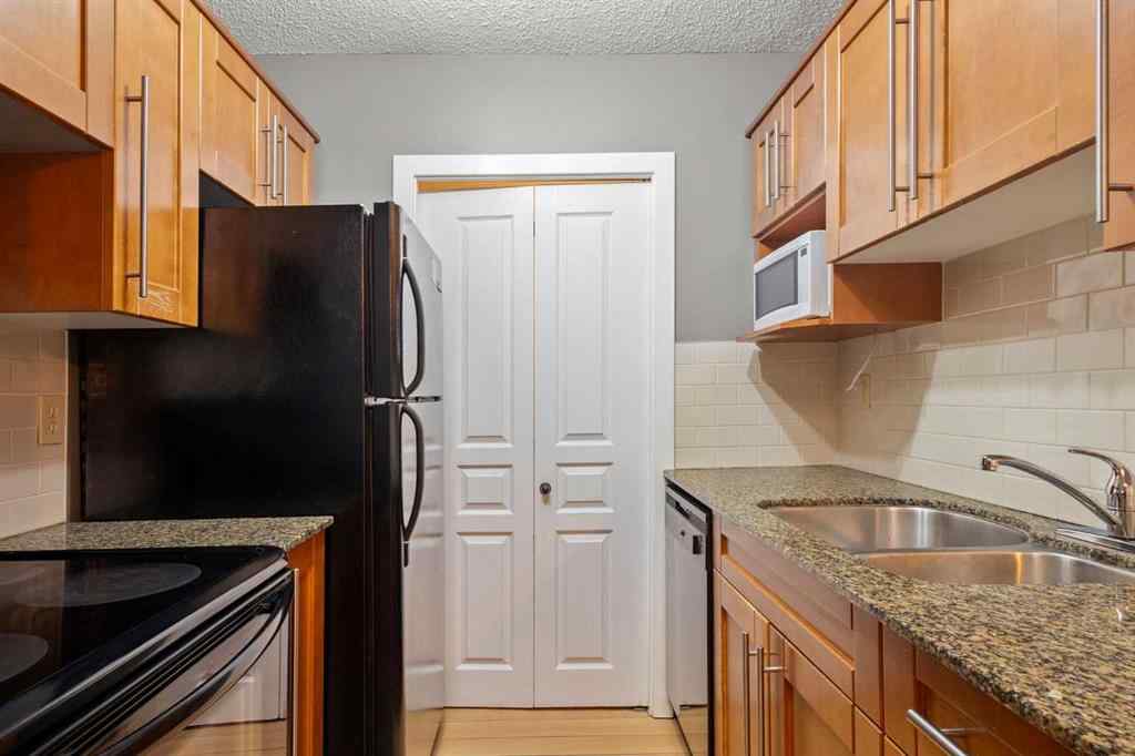 MLS&reg; # A2260039 - Unit #412 6400 Coach Hill Road SW in Coach Hill Calgary, Residential Open Houses