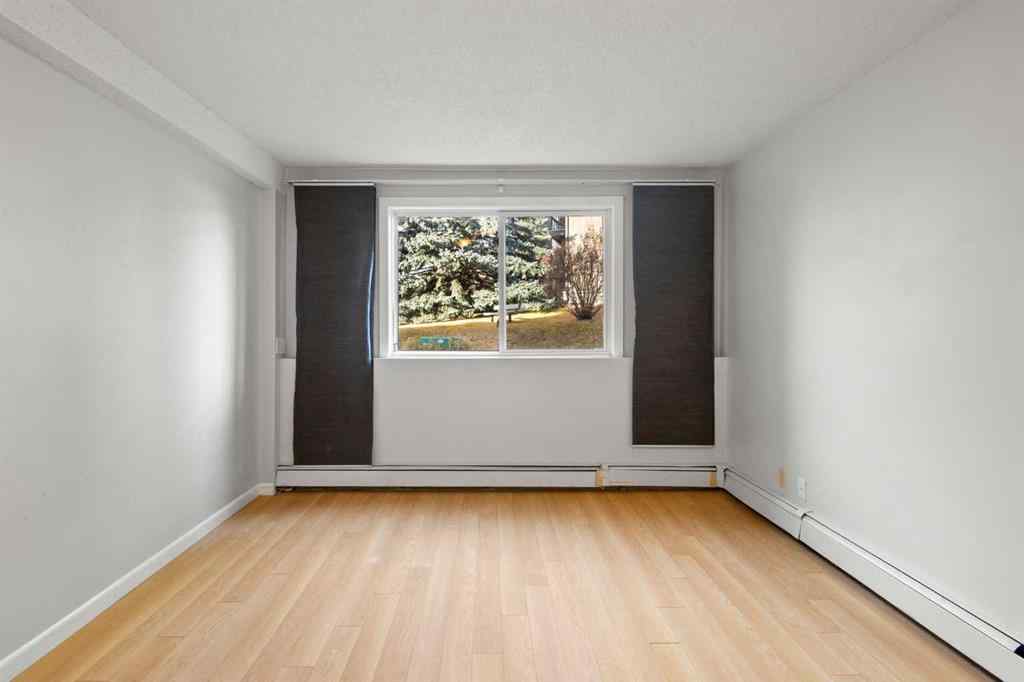 MLS&reg; # A2260039 - Unit #412 6400 Coach Hill Road SW in Coach Hill Calgary, Residential Open Houses