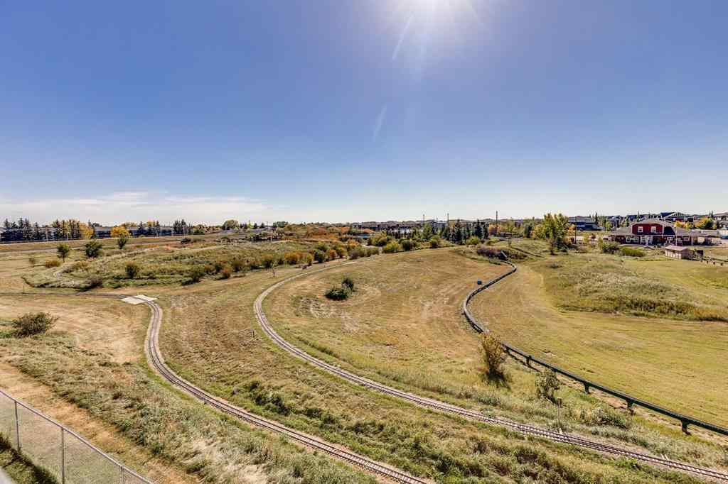 MLS® A2260044 - Unit #7308 304 Mackenzie Way SW in Downtown Airdrie, Residential