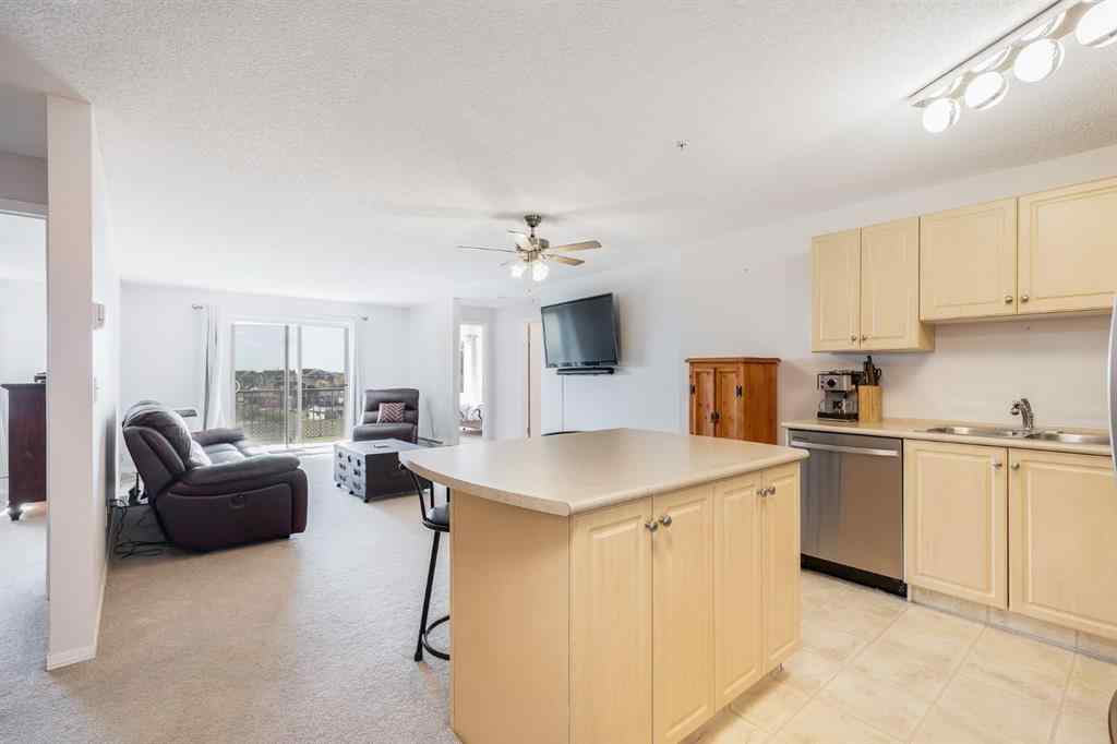 MLS® A2260044 - Unit #7308 304 Mackenzie Way SW in Downtown Airdrie, Residential