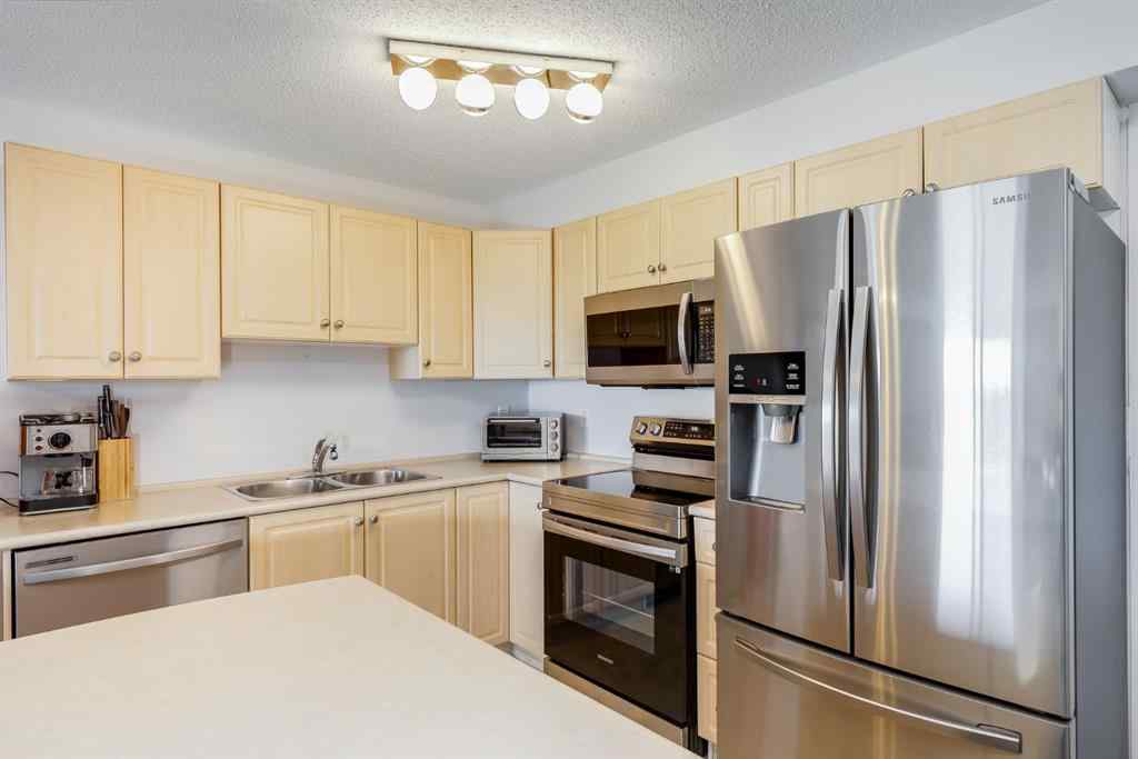 MLS® A2260044 - Unit #7308 304 Mackenzie Way SW in Downtown Airdrie, Residential