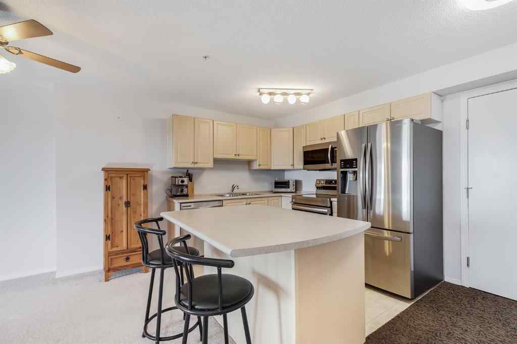 MLS® A2260044 - Unit #7308 304 Mackenzie Way SW in Downtown Airdrie, Residential