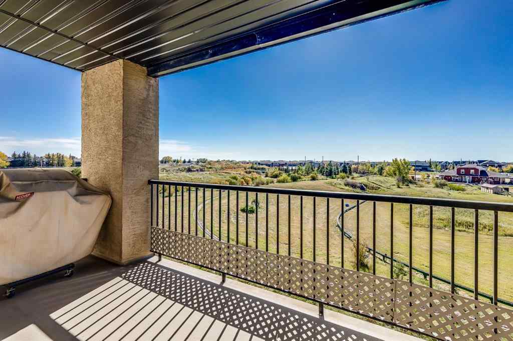 MLS® A2260044 - Unit #7308 304 Mackenzie Way SW in Downtown Airdrie, Residential