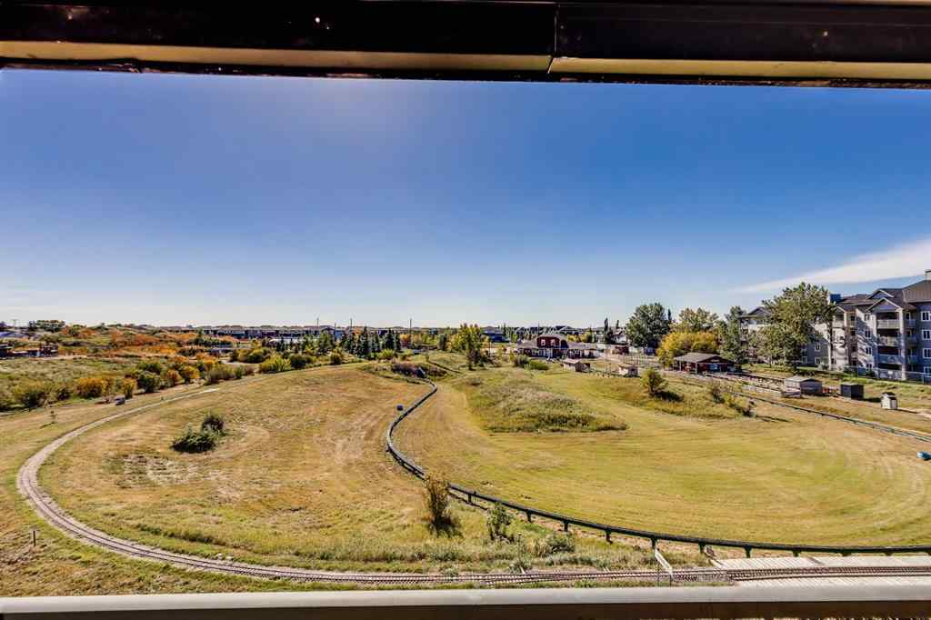 MLS® A2260044 - Unit #7308 304 Mackenzie Way SW in Downtown Airdrie, Residential