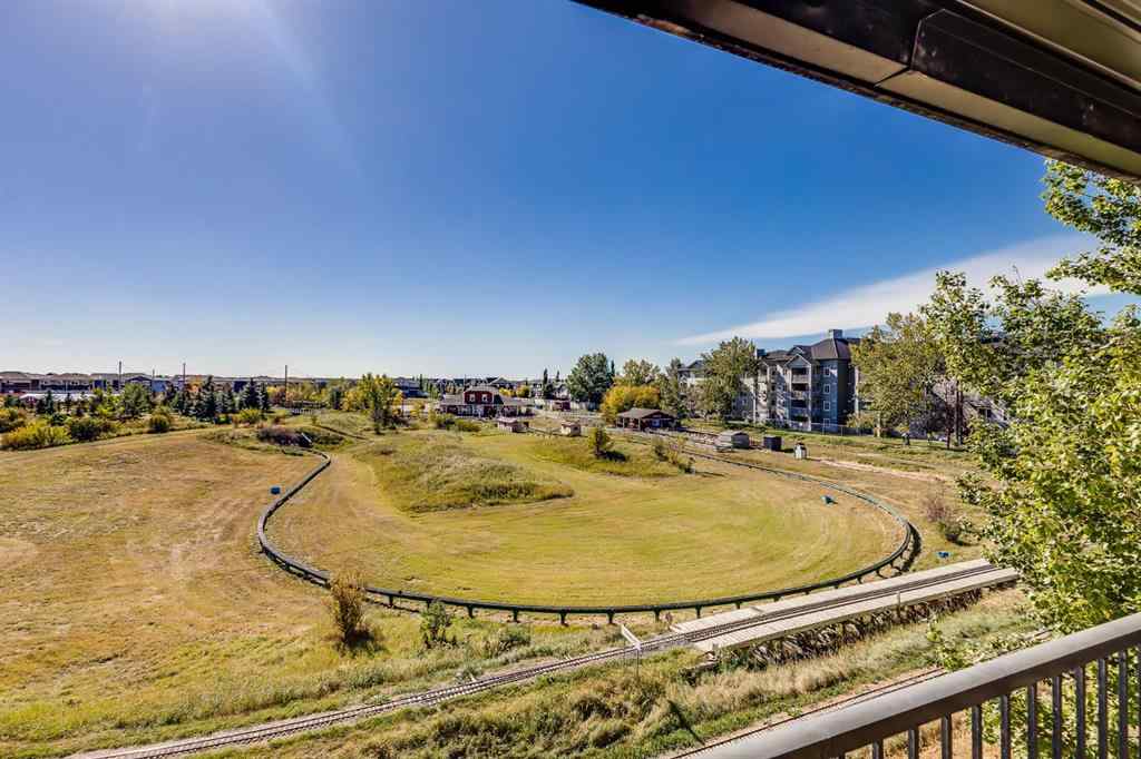 MLS® A2260044 - Unit #7308 304 Mackenzie Way SW in Downtown Airdrie, Residential
