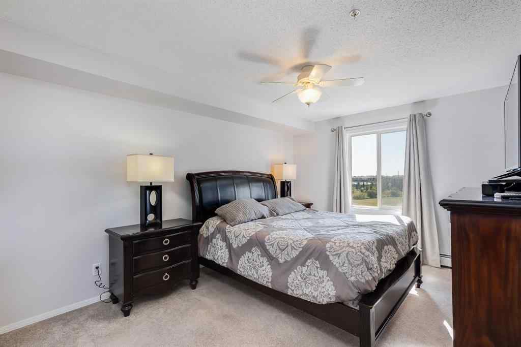 MLS® A2260044 - Unit #7308 304 Mackenzie Way SW in Downtown Airdrie, Residential
