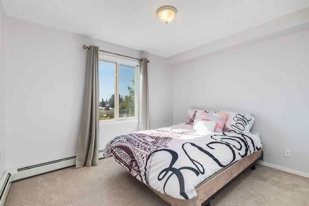 MLS® A2260044 - Unit #7308 304 Mackenzie Way SW in Downtown Airdrie, Residential