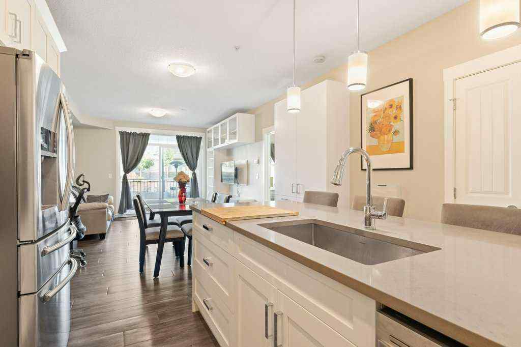 MLS® A2260059 - Unit #104 110 Auburn Meadows View SE in Auburn Bay Calgary, Residential