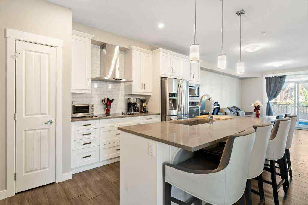 MLS® A2260059 - Unit #104 110 Auburn Meadows View SE in Auburn Bay Calgary, Residential