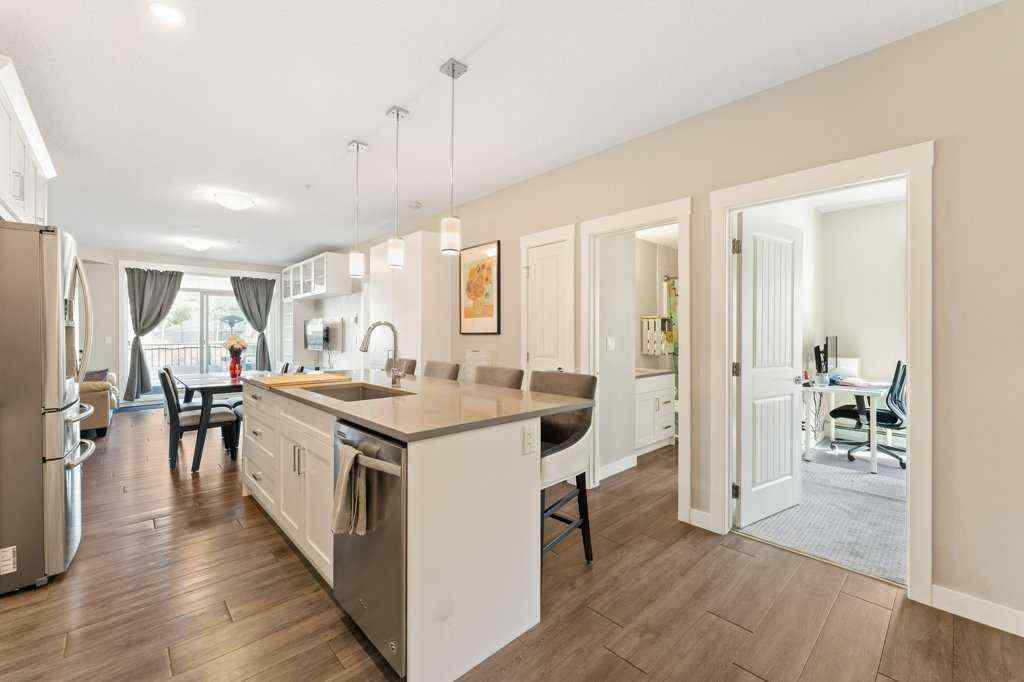 MLS® A2260059 - Unit #104 110 Auburn Meadows View SE in Auburn Bay Calgary, Residential