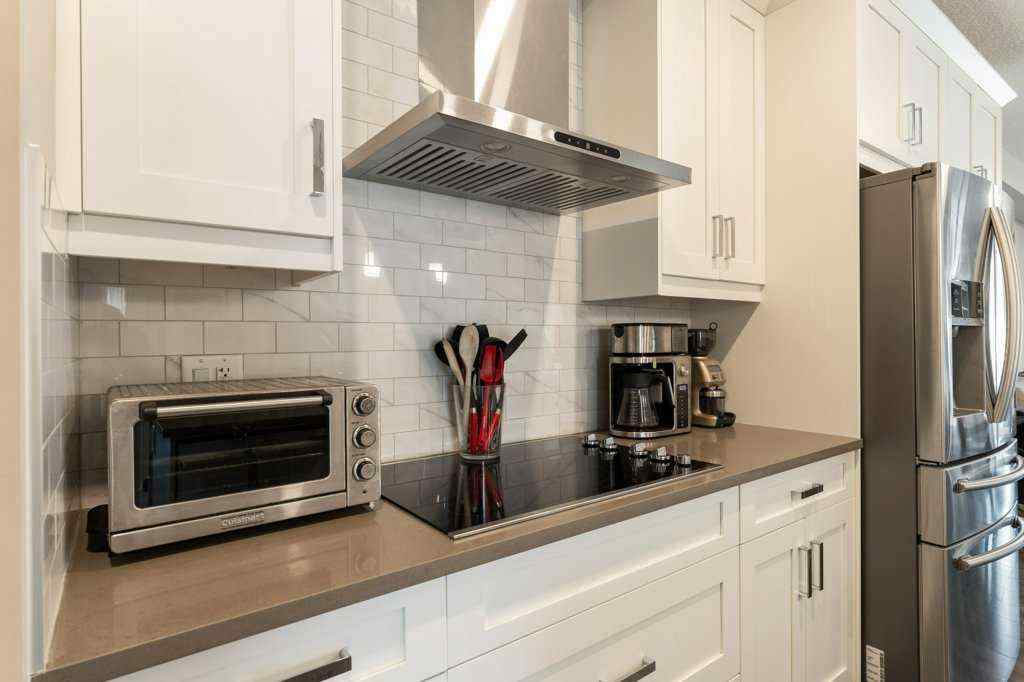 MLS® A2260059 - Unit #104 110 Auburn Meadows View SE in Auburn Bay Calgary, Residential