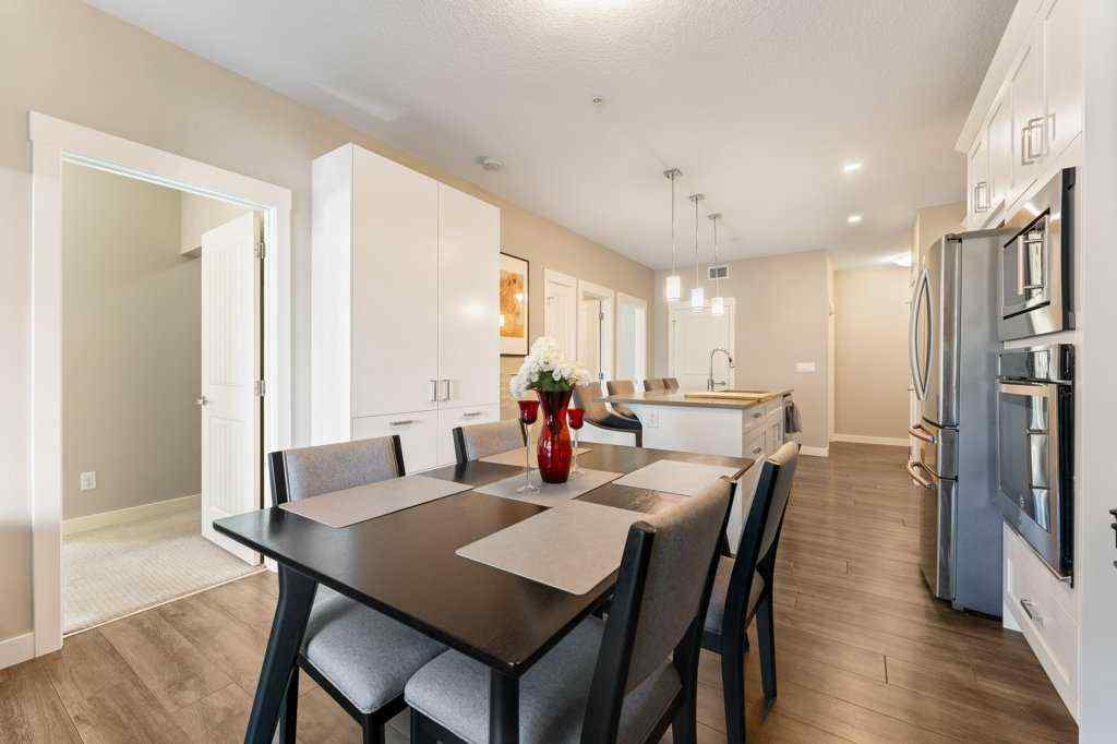 MLS® A2260059 - Unit #104 110 Auburn Meadows View SE in Auburn Bay Calgary, Residential