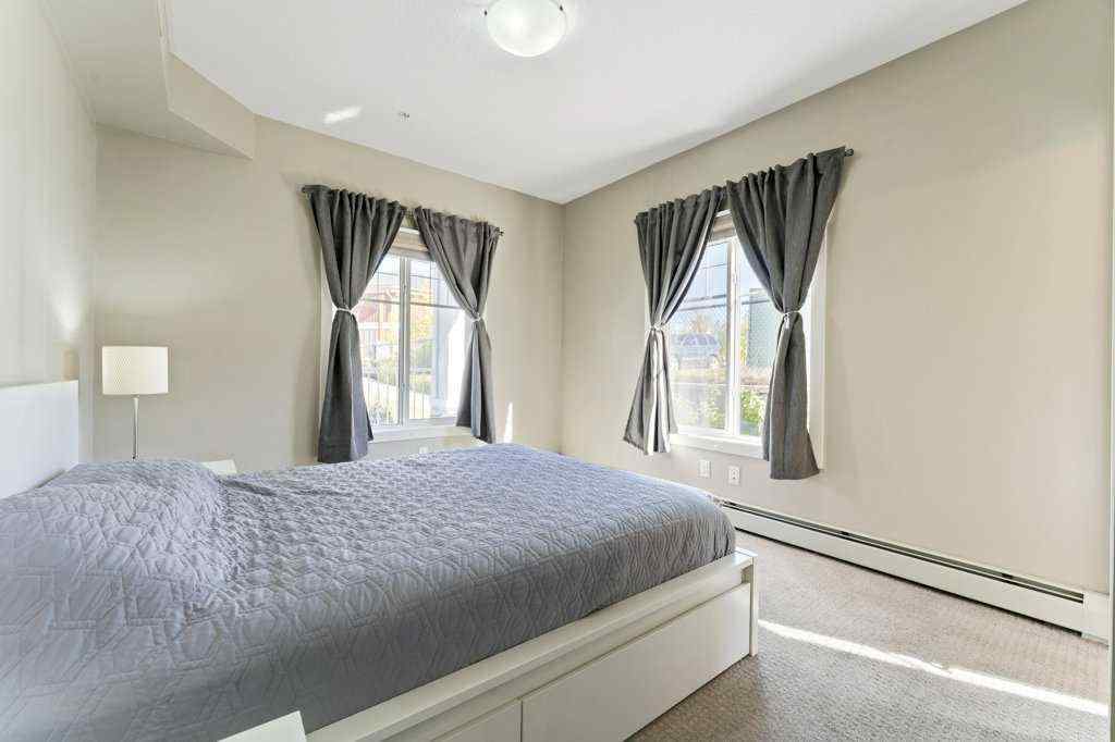 MLS® A2260059 - Unit #104 110 Auburn Meadows View SE in Auburn Bay Calgary, Residential