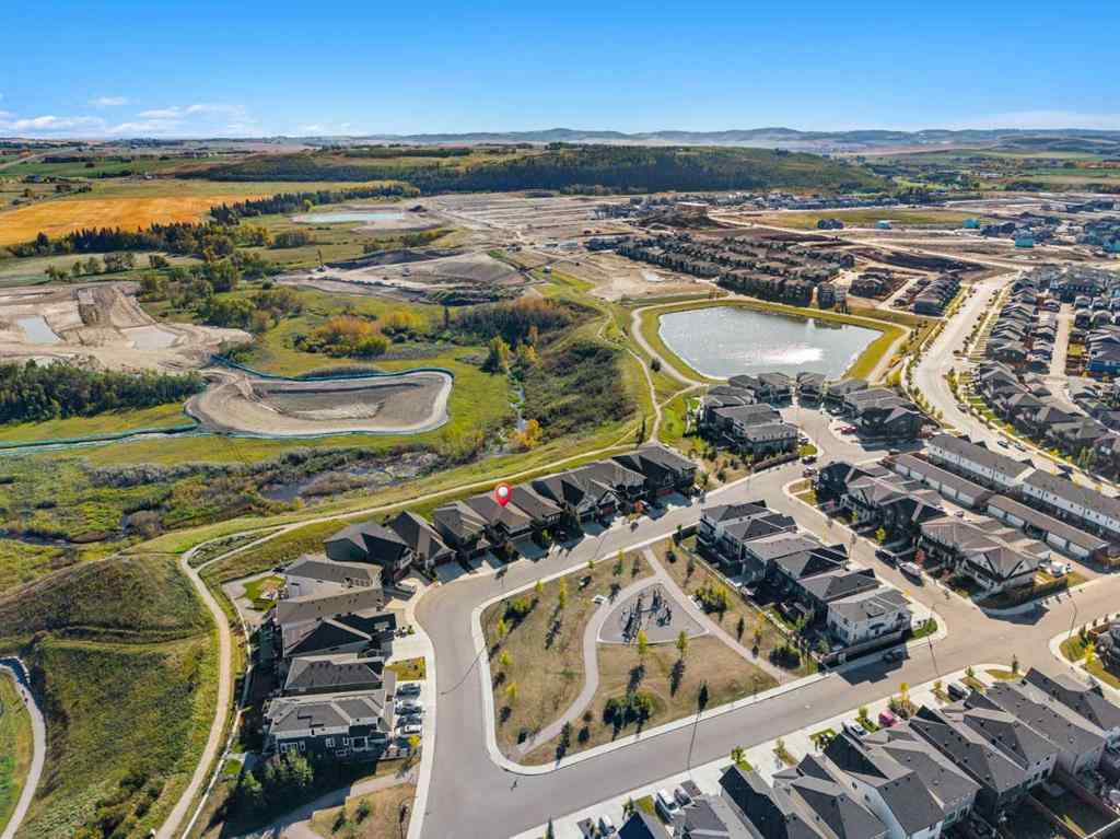 MLS® A2260063 - 51 Creekstone Way SW in Pine Creek Calgary, Residential