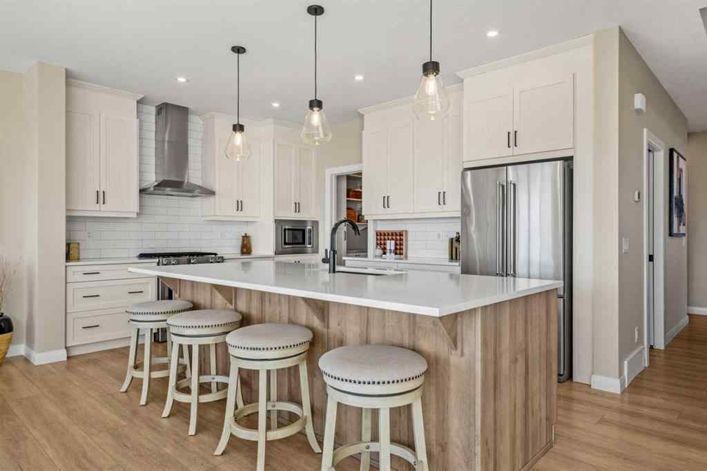 MLS® A2260063 - 51 Creekstone Way SW in Pine Creek Calgary, Residential