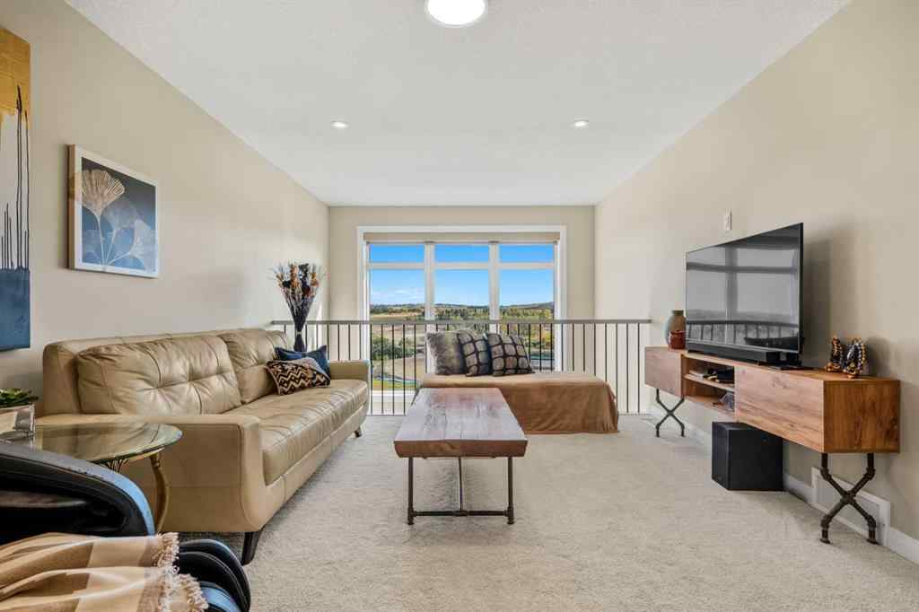 MLS® A2260063 - 51 Creekstone Way SW in Pine Creek Calgary, Residential