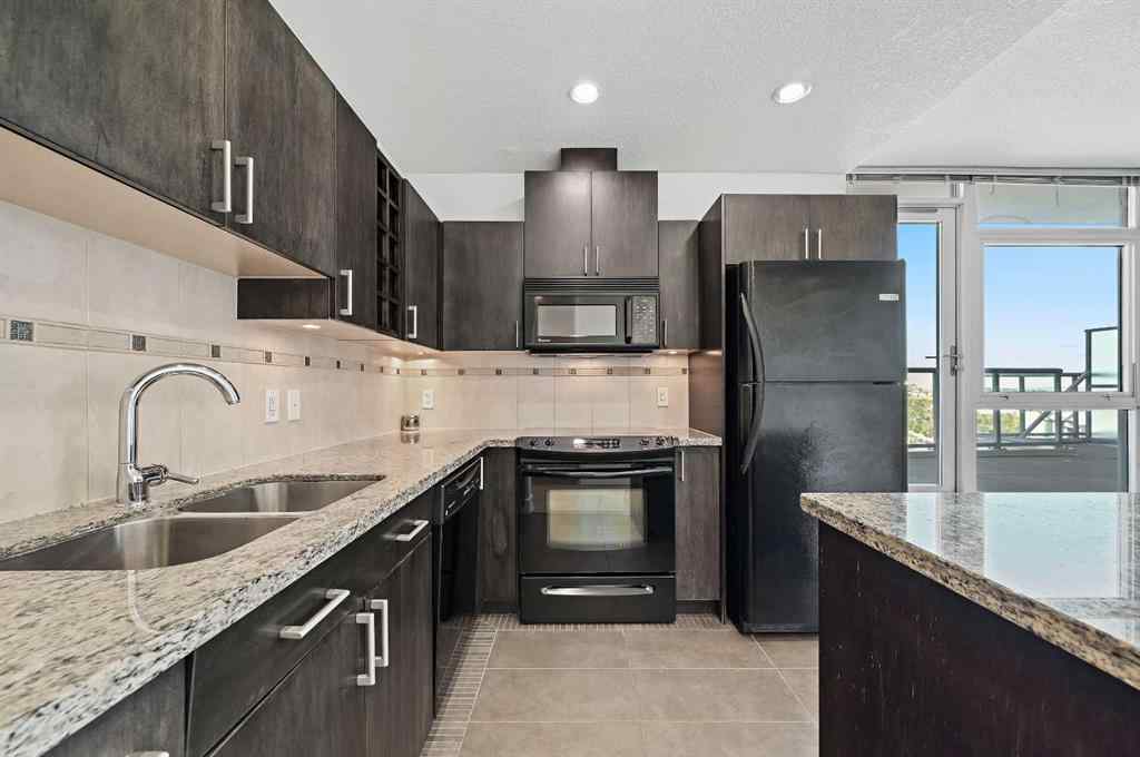 MLS® A2260065 - Unit #2404 77 Spruce Place SW in Spruce Cliff Calgary, Residential