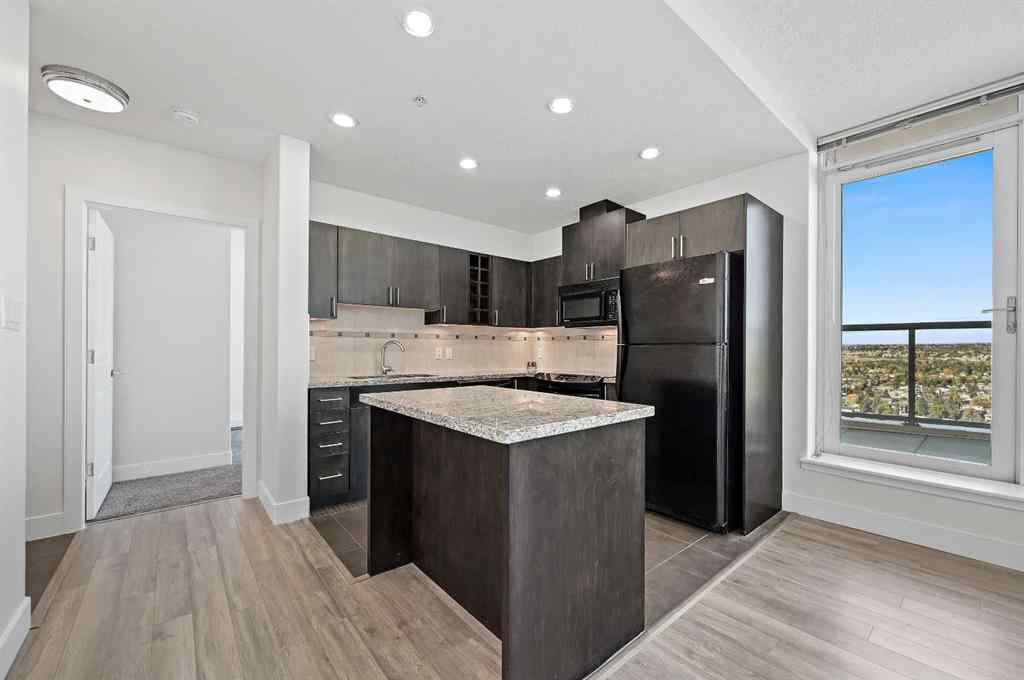 MLS® A2260065 - Unit #2404 77 Spruce Place SW in Spruce Cliff Calgary, Residential