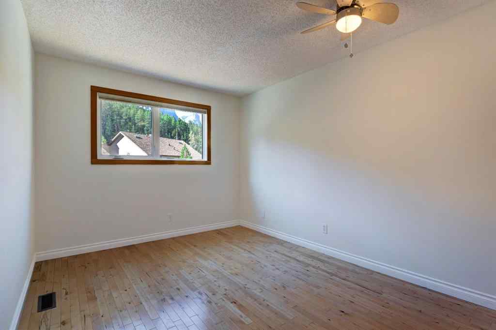 MLS® A2260089 - Unit #105 200 Three Sisters Drive  in Hospital Hill Canmore, Residential