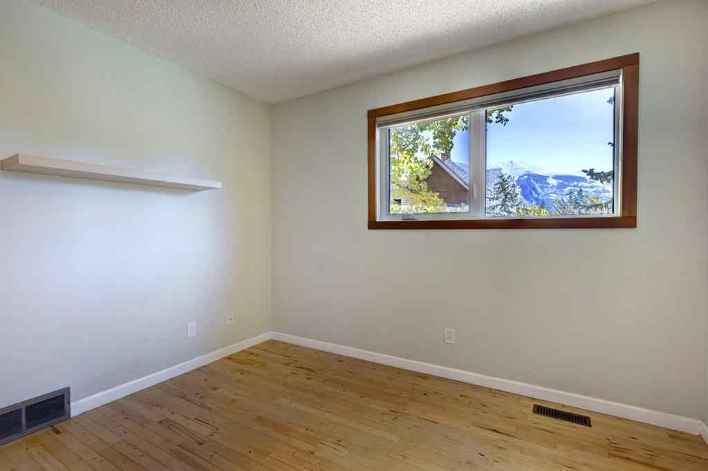 MLS® A2260089 - Unit #105 200 Three Sisters Drive  in Hospital Hill Canmore, Residential