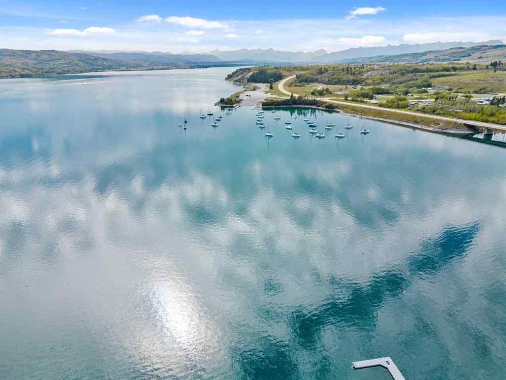 MLS® A2260091 - 210 CottageClub Crescent  in Cottage Club at Ghost Lake Rural Rocky View County, Residential