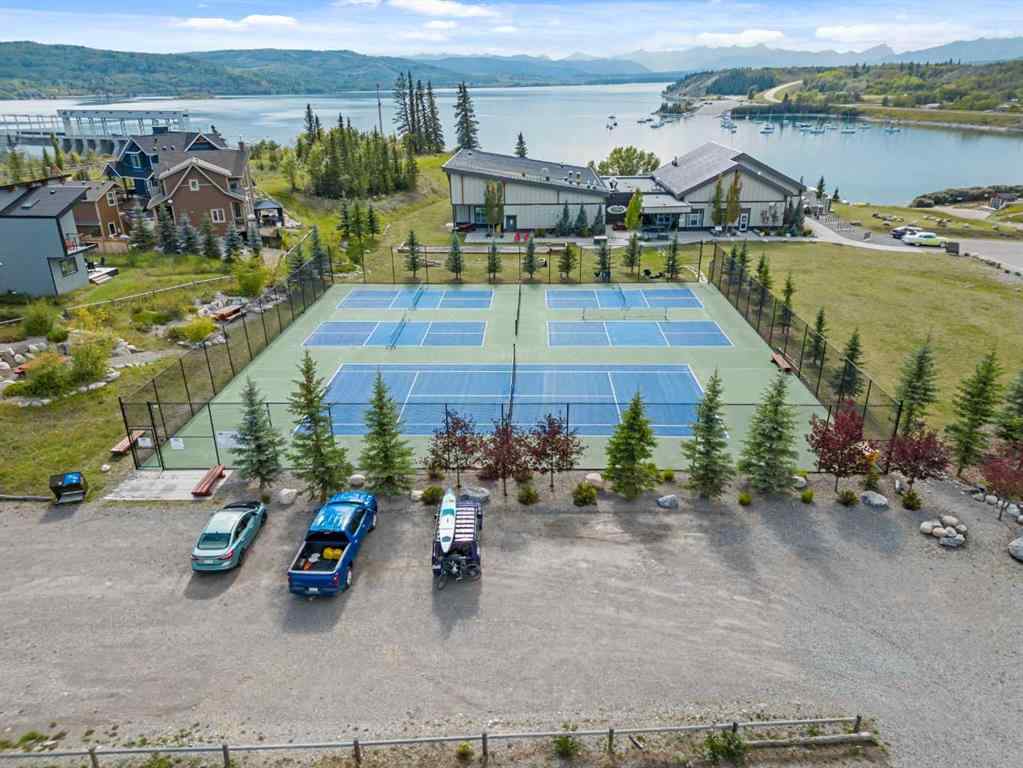 MLS® A2260091 - 210 CottageClub Crescent  in Cottage Club at Ghost Lake Rural Rocky View County, Residential