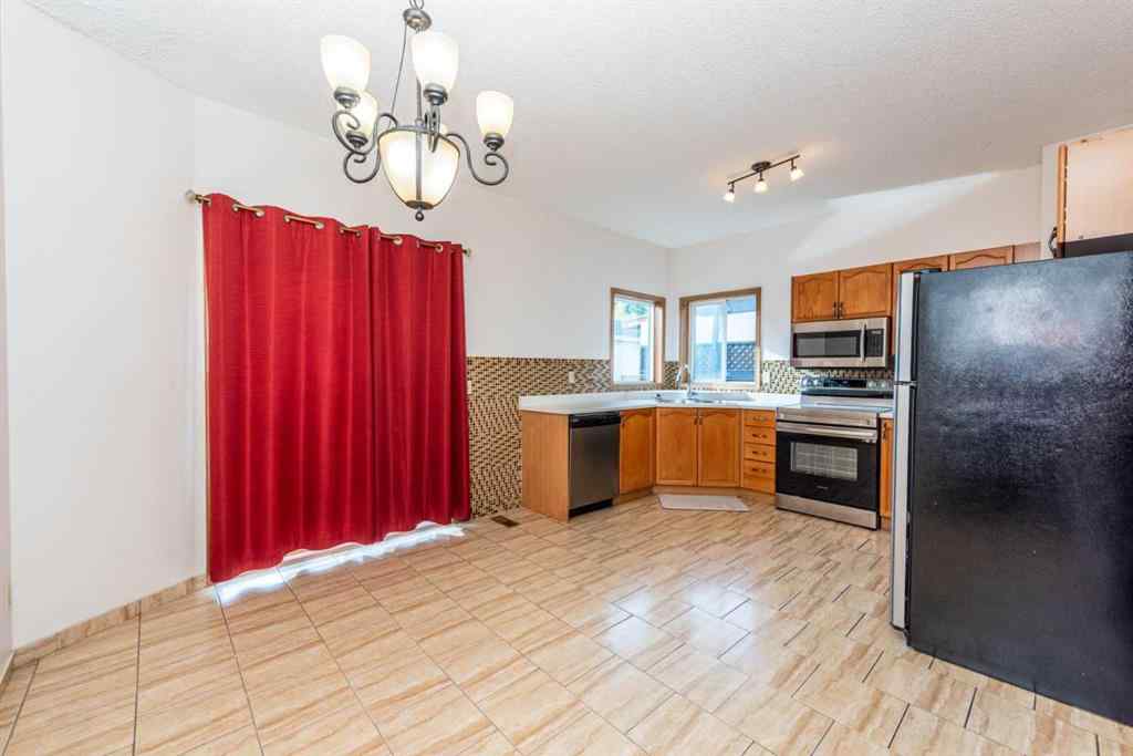 MLS® A2260094 - 14993 5 Street SW in Millrise Calgary, Residential