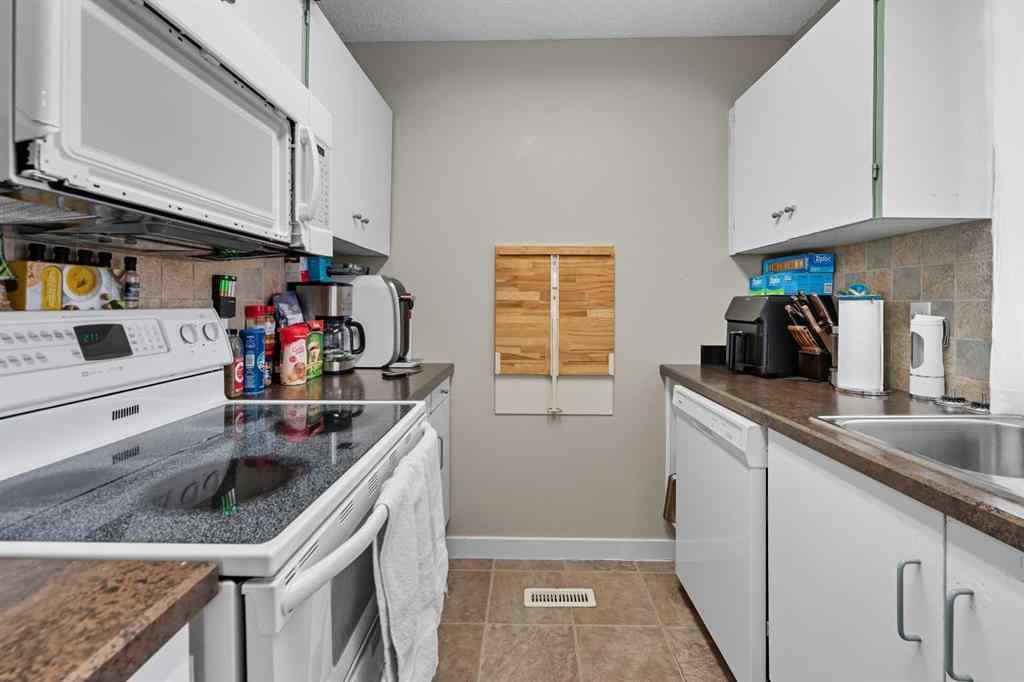 MLS® A2260118 - Unit #201 829 Coach Bluff Crescent SW in Coach Hill Calgary, Residential