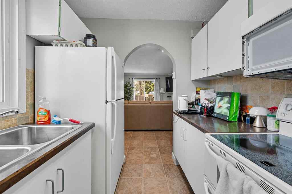 MLS® A2260118 - Unit #201 829 Coach Bluff Crescent SW in Coach Hill Calgary, Residential