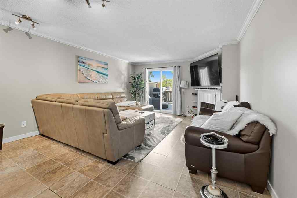 MLS® A2260118 - Unit #201 829 Coach Bluff Crescent SW in Coach Hill Calgary, Residential