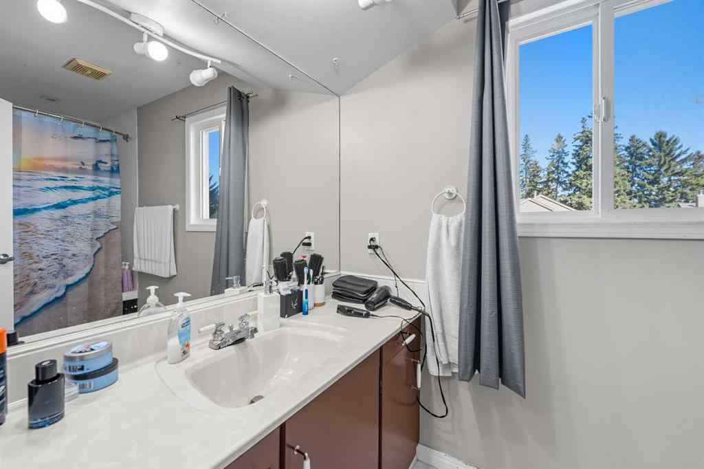 MLS® A2260118 - Unit #201 829 Coach Bluff Crescent SW in Coach Hill Calgary, Residential