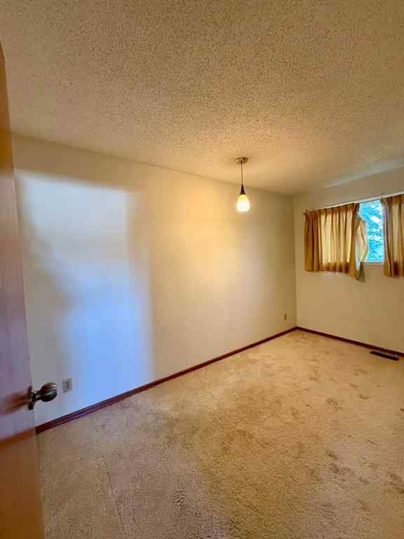 MLS® A2260148 - 11027 Bradbury Drive SW in Braeside Calgary, Residential