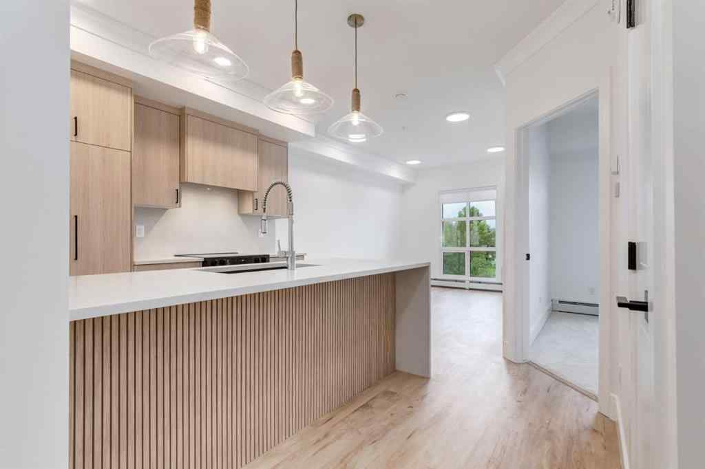 MLS® A2260164 - Unit #406 330 Dieppe Drive SW in Currie Barracks Calgary, Residential