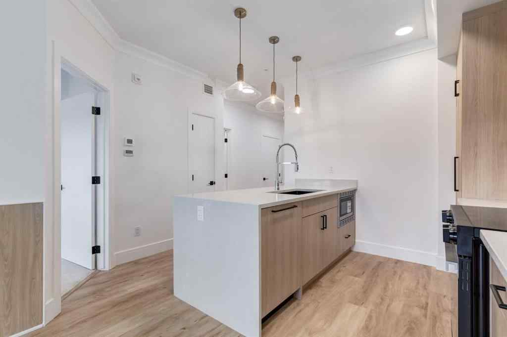 MLS® A2260164 - Unit #406 330 Dieppe Drive SW in Currie Barracks Calgary, Residential